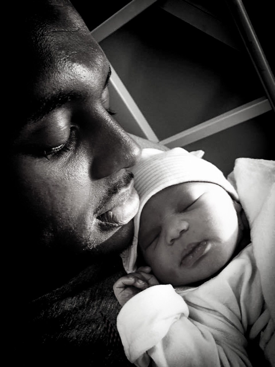 Father and Newborn Portrait